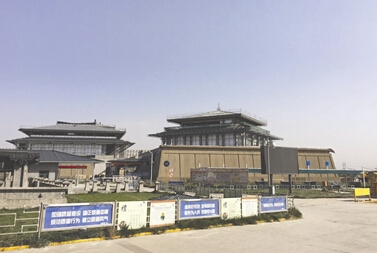 秦始皇头上动土 咸阳宫保护遗址绿化带捡到秦代石磬